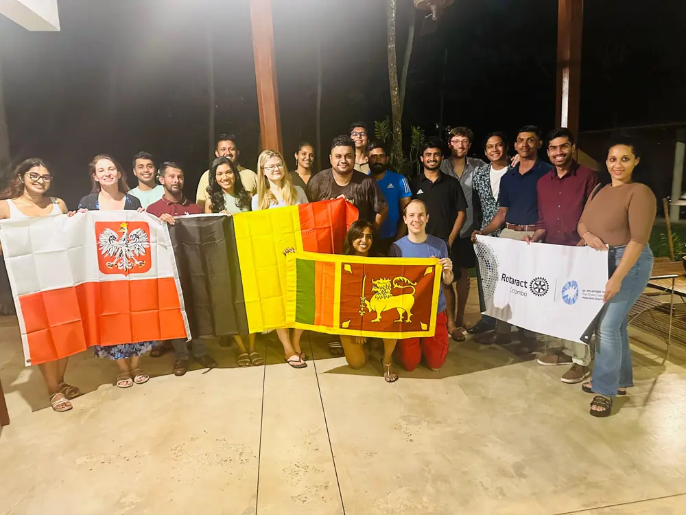 Escape to Paradise participants with national flags